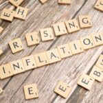 the word inflation written on wooden blocks