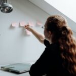 a person taking notes