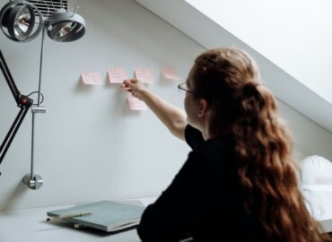 a person taking notes